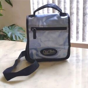 Limited Too Shining blue crossbody bag w/lots of pockets and adjustable strap.